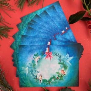 een set van toen mooie stevige ansichtkaarten van ene kerstkrans met vogeltjes